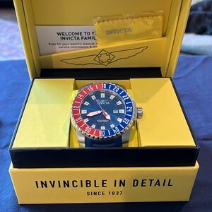 Invicta pro diver 52mm red, white, and blue.
